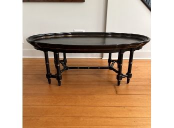 A Maitland - Smith Ebonized Hand Painted Pie Crust Tray  Coffee Table