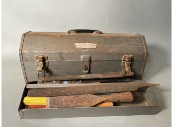 A Vintage Metal Craftsman Toolbox With Some Goodies Inside