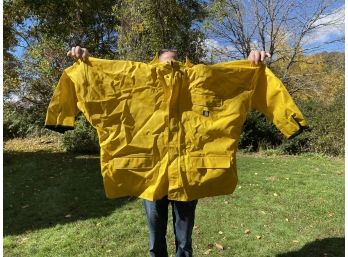 A Carthart 2 XL Yellow Rain Jacket