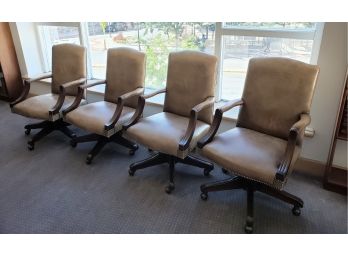 Four More Green/gray Leather Conference Room Arm Chairs On Wheels