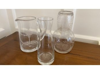 A Group Of Three Glass Items  - Pitcher, Night Table Carafe With Glass & Wine Decanter.