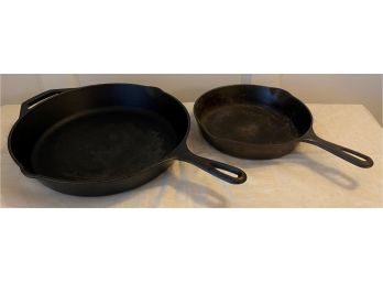 ONE LODGE Cast Iron Fry Pan US & ONE GRISWOLD Cast Iron Fry Pan Erie PA.
