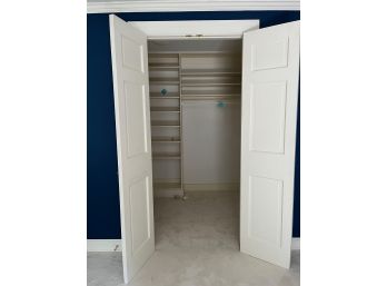 A Custom Closet Shelving System In Wood - Hers