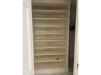 A Custom Closet Shelfing System In Wood - Primary His