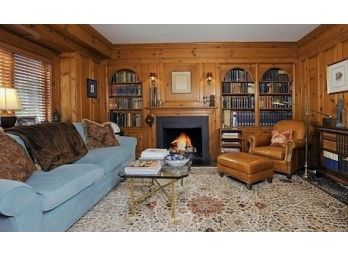 A Complete Wood Paneled Library Including Sconces, Doors, Gas Fireplace, Blinds