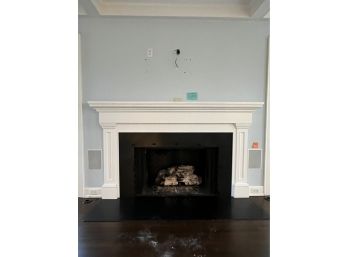 A Wood Fireplace Surround And Mantel - Family Room