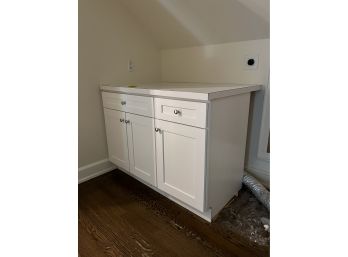 A Laminate Top Wood Cabinet