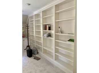 A Wall Of Custom Built In Wood Shelving - Office