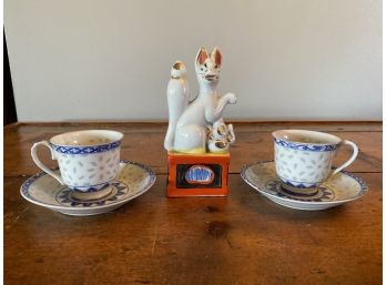 Pair Of Teacups And Oriental Statue