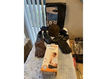 Mens Lot, Gloves, That Derby Hat, Cushion For The Toosh, And A Heating Pad When You Need Some Support!