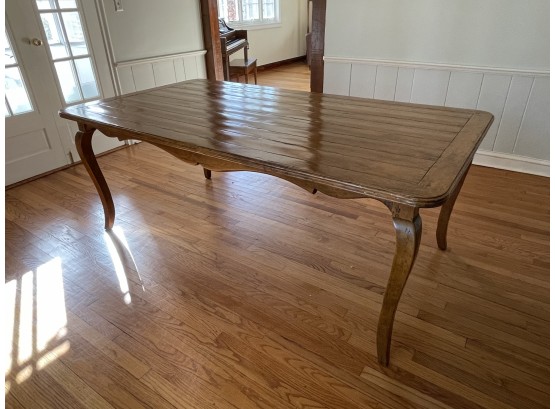 A French Provincial Planked Top Dining Table