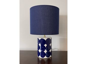 White Ceramic Table Lamp With Dark Blue Abstract Circle Pattern And Blue Lampshade