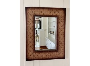 A Large Wall Mirror With Heavy Beveled Glass Plate In An Embossed Faux Leather Frame