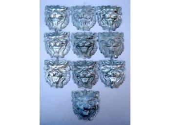 199. Galvanized Stamped Metal Lion Heads