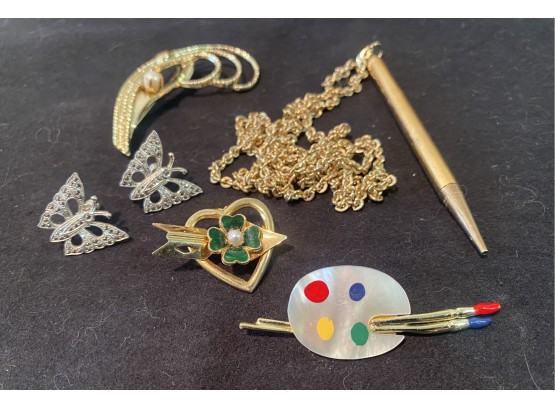 Costume Jewelry Pins, Earrings, And Pencil On Chain