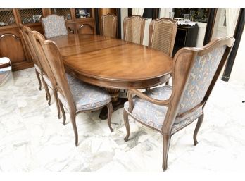 Oval Carved Wood Double Pedestal Table With Six Cane Back Dining Chairs And Two Cushioned Armchairs