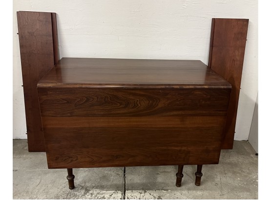 Slick Clean Cherry Drop Leaf Table With Four Leaves