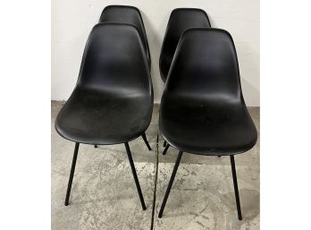 Four Modern Molded Chairs