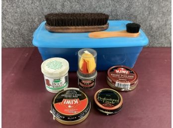 Small Blue Tote Of Shoe Polish And Brushes