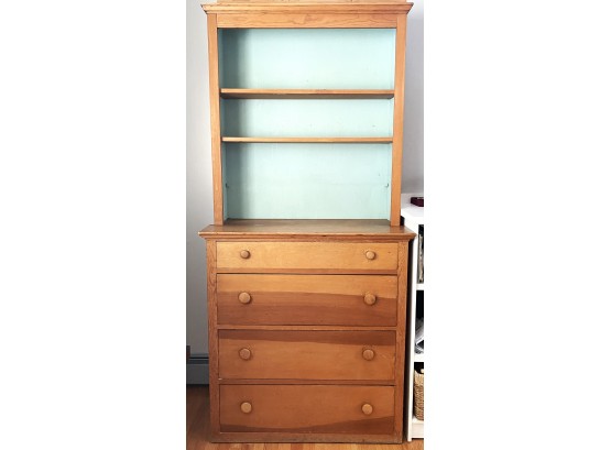 Tall Wall Unit With Four Lower Drawers And Attached Shelves