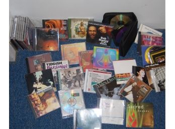 Group Of CD's With Miles Davis, Bob Marley And Some Inside Included Carry Case