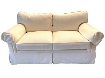 Rolled Arm Love Seat In A Light Color Upholstery . #2