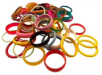 Over 70 Plastic Bracelets And More.