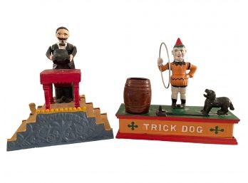 Pair Of Reproduction Cast Iron Mechanical Banks Magician And A Trick Dog.