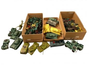 Collection Of Plastic Soldiers And Other Military Equipment.