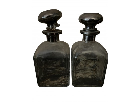 Pair Of Glass Decanters With Silver Stoppers