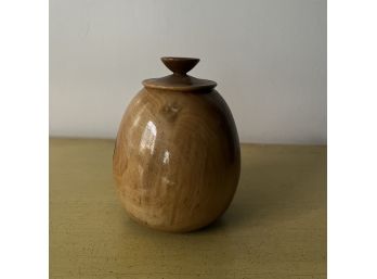 A Carved And Signed Wood Vase