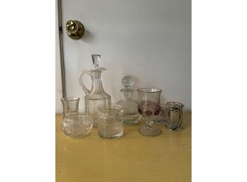 A Collection Of Various Glass Pieces