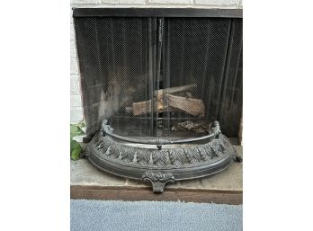 An Antique Cast Iron Fireplace Fender