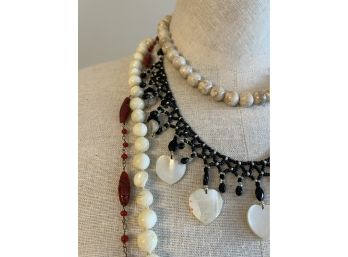 Four Costume Jewelry Necklaces - Longest 36'