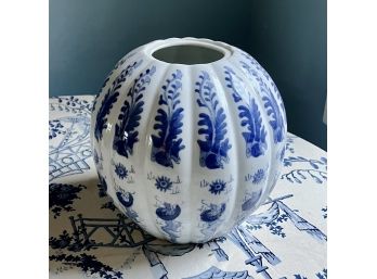 A Round Ribbed Form Blue And White Chinese Vase