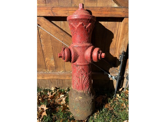 Old Collectible Red Fire Hydrant With An Interesting Design