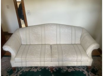 Camelback Loveseat With Wood Legs
