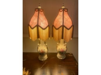 Pair Of White Rococo Style Table Lamps With Roses And Fringed Shade