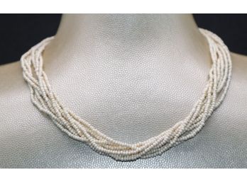 8 Strand Ivory Color Necklace