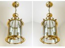A Pair Of Brass And Glass Lantern Fixtures