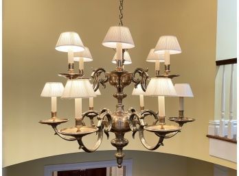 A Grand And Enormous Two Tiered Brass Chandelier