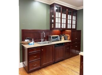 A Wall Of Mahogany Cabinets, Sink, And Granite Counters - Uppers And Lowers
