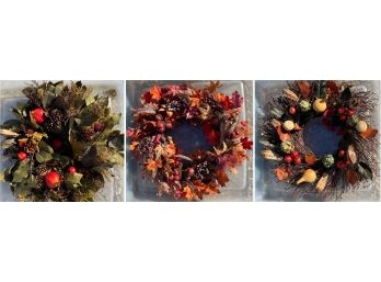 A Set Of 3 Large Decorative Faux Floral Wreaths - In Wreath Storage Bins