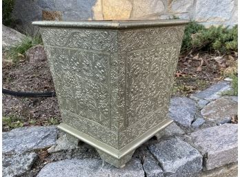 An Etched Brass Wrapped Wastebasket