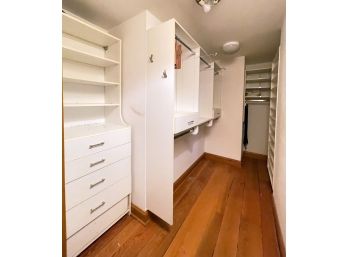 A Large Built In Closet Organizer By California Closets