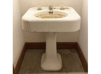 An Antique Cast Iron Pedestal Sink