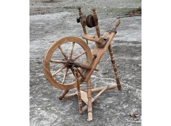 An Antique Spinning Wheel