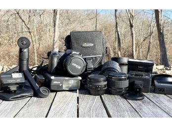 Vintage Nikon Camera And Assorted Lenses And Accessories