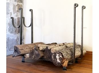 A Modern Wrought Iron Wood Rack