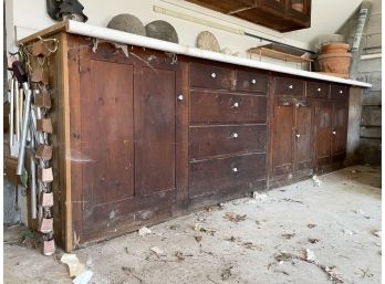 A Long Run Of Vintage Pine Lower Cabinets